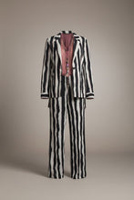 Load image into Gallery viewer, Petit Pois by Viviana G black and white vertical stripe oversized suit with pink satin shirt and beaded necklace.